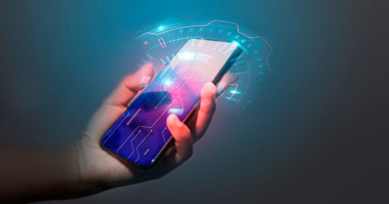 Mobile phones with analytics graphs indicating connectivity.
